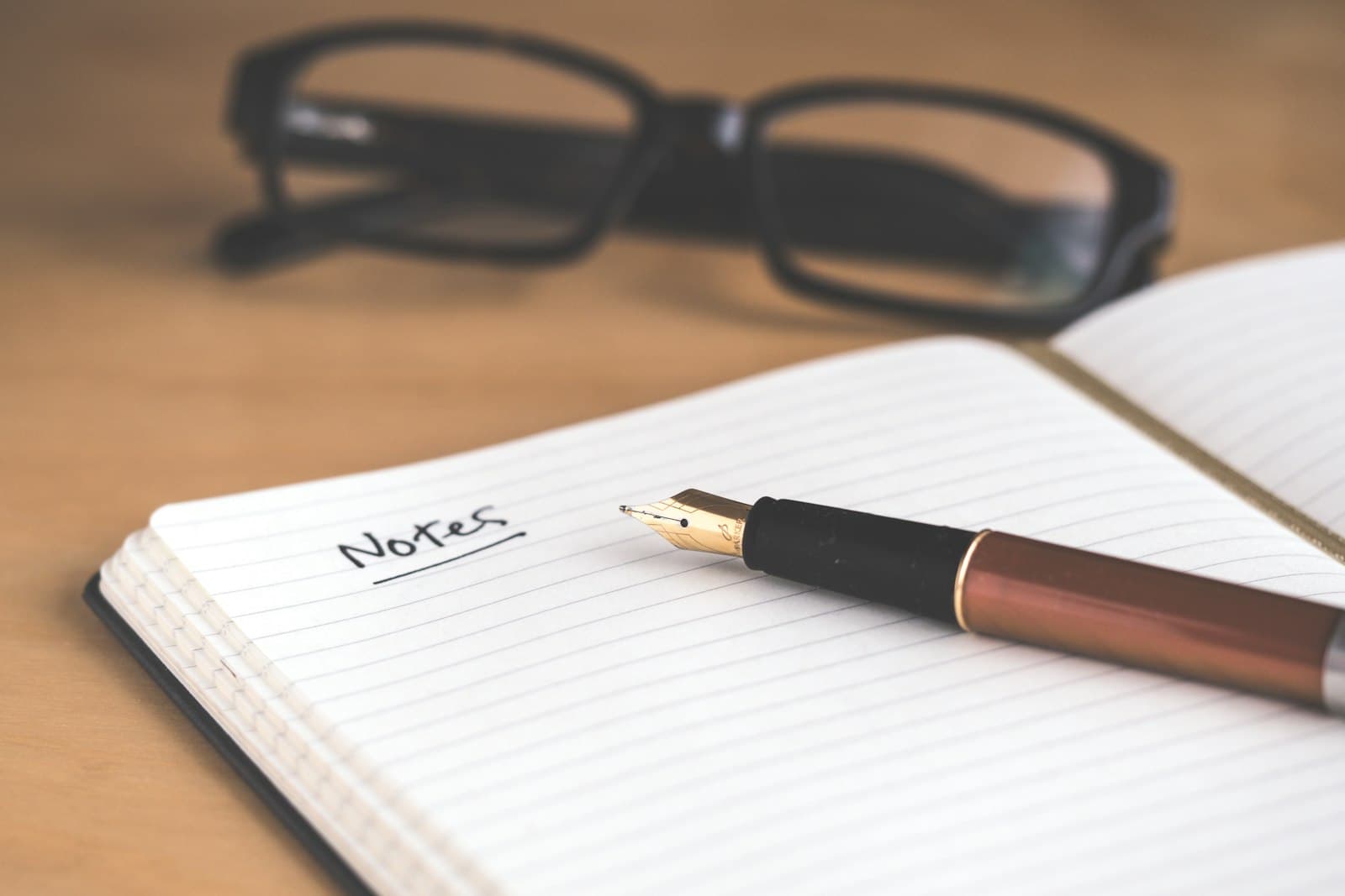 Handwriting and notes on paper while a process is being understood