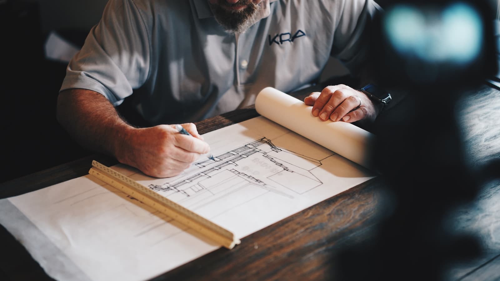 Architectural plans spread on a table