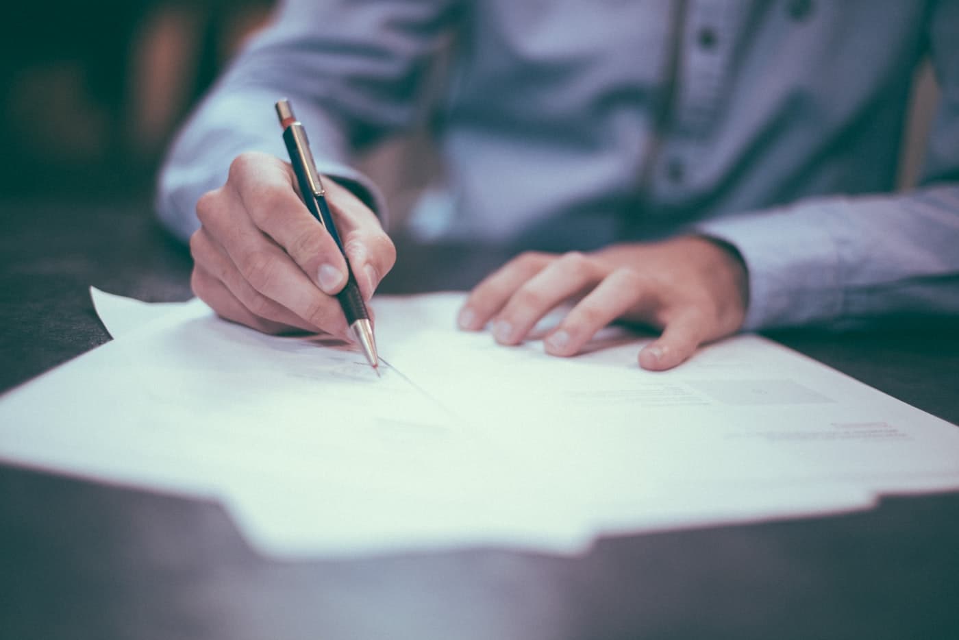 Close view of paperwork being reviewed